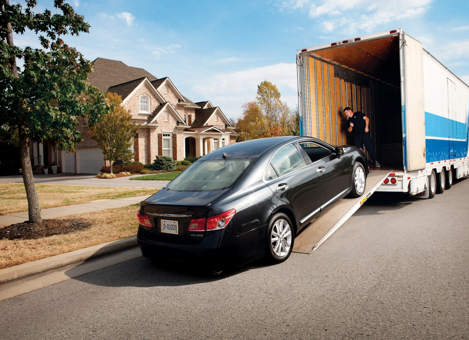 Loading car into Atlas moving truck